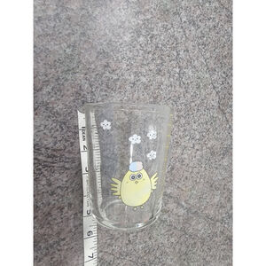 Children's glass with a chick motif